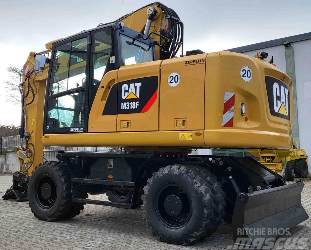 CAT M 318 F, Finanzierung möglich Wheeled excavators