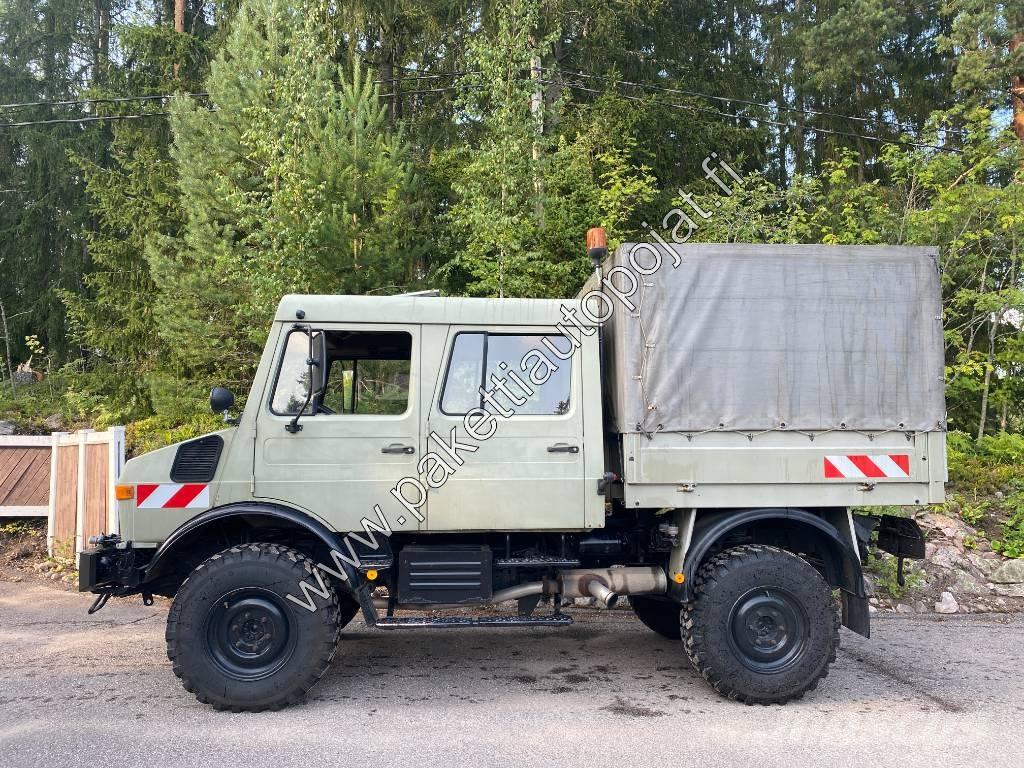Unimog U 1250L DoKa Curtainsider trucks