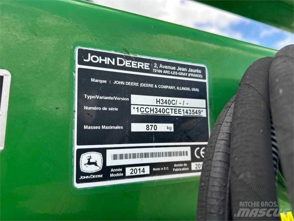 John Deere 6115M Tractors