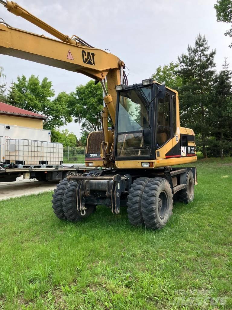 CAT M 312 Wheeled excavators