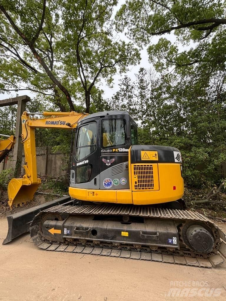 CAT pc 128us Midi excavators  7t - 12t
