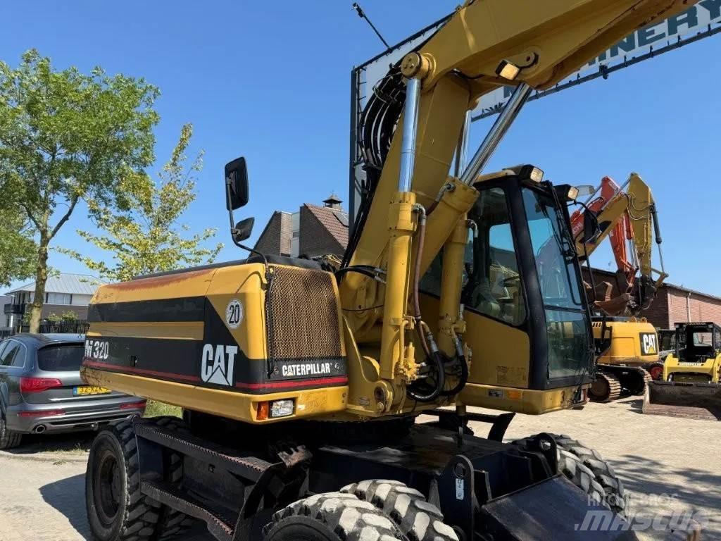 CAT M320 2001 Wheeled excavators