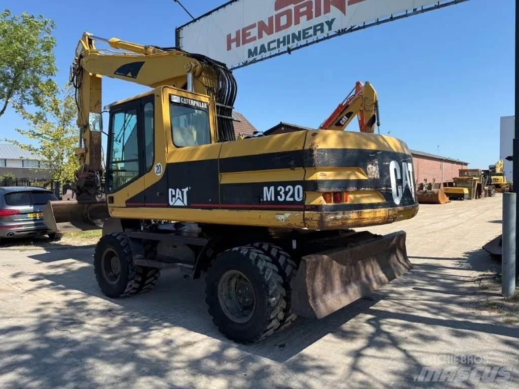 CAT M320 2001 Wheeled excavators