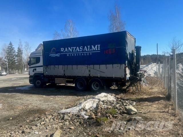 Scania R 12 LB Curtainsider trucks