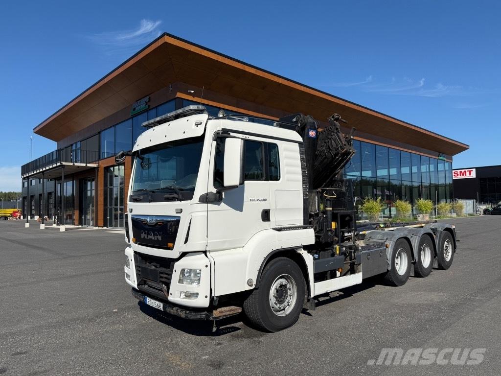 MAN Crane + hook lift Crane trucks