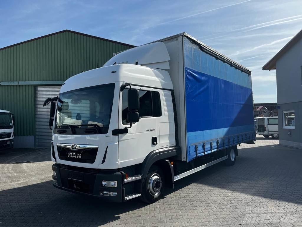 MAN TGL 8.220 Curtainsider trucks