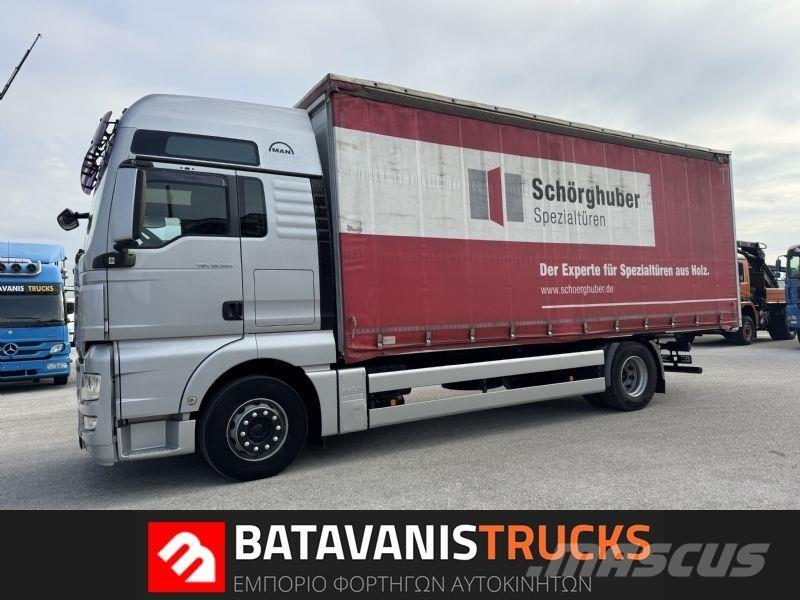 MAN TGX 18.360 ADR Curtainsider trucks