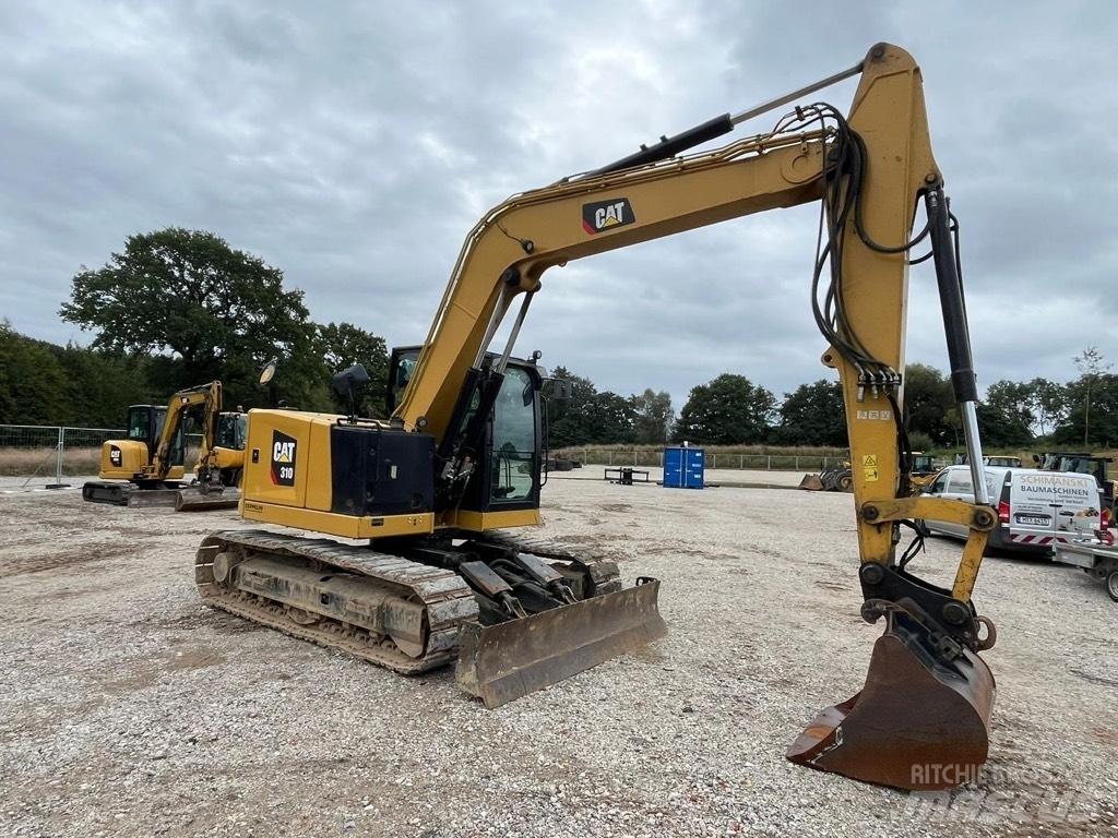CAT 310 Midi excavators  7t - 12t
