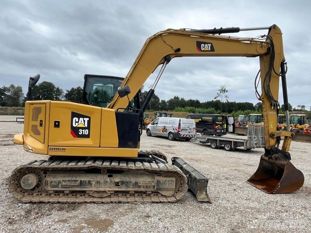 CAT 310 Midi excavators  7t - 12t