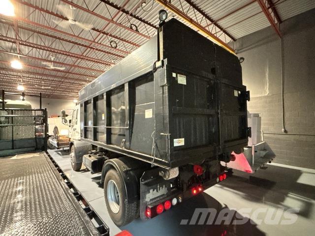 GMC T7500 Skip loader trucks