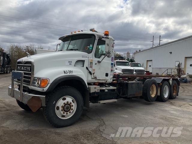 Mack CV713 Skip loader trucks