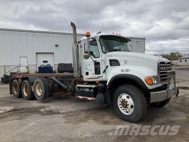 Mack CV713 Skip loader trucks
