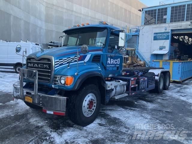 Mack CV713 Skip loader trucks