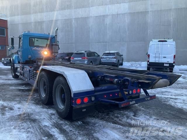 Mack CV713 Skip loader trucks