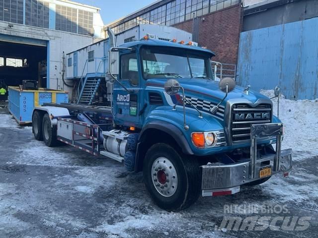 Mack CV713 Skip loader trucks