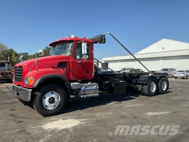 Mack CV713 Skip loader trucks