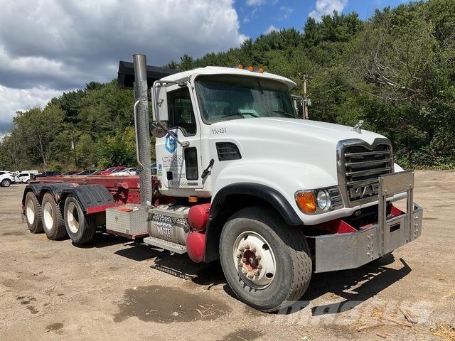 Mack CV713 Skip loader trucks