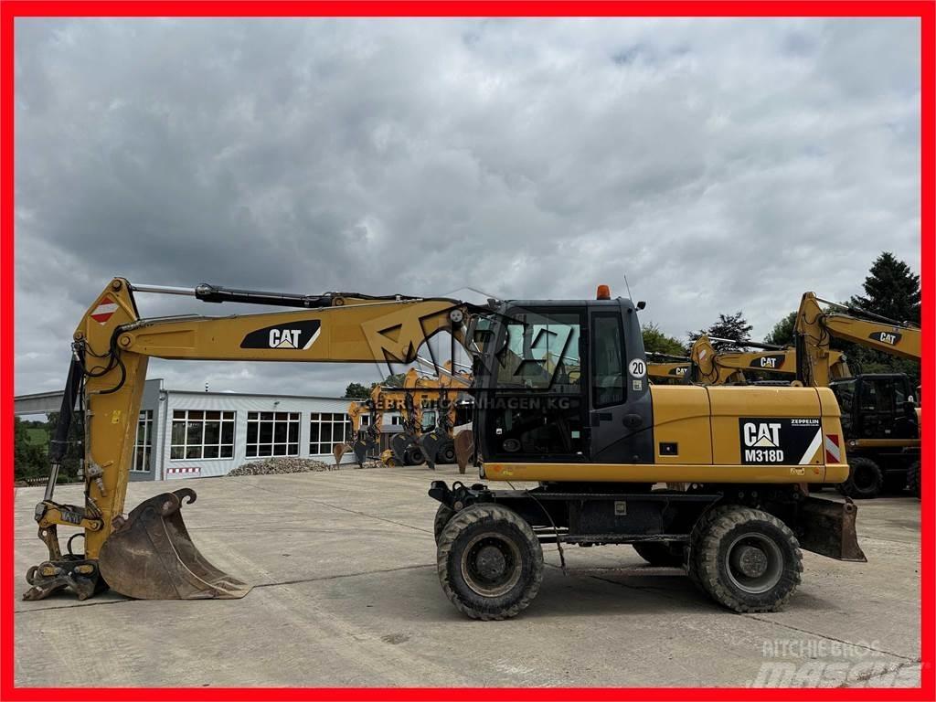 CAT M 318 D Wheeled excavators