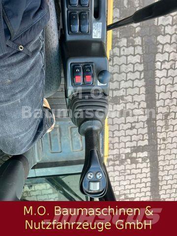 CAT MH 3022 Wheeled excavators