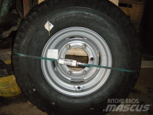  - - - 300-80-15.3 Tyres, wheels and rims