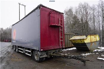 Tyllis Chip trailer w/ hydraulic roof and backward tip.