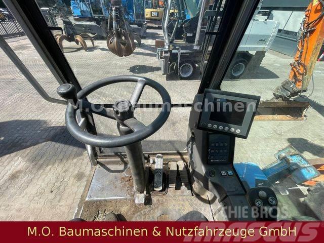 Fuchs MHL 320/ZSA/Hochfahrbare Kabine/ Wheeled excavators