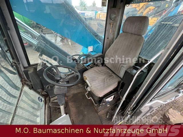 Fuchs MHL 331 / ZSA / AC / Hochfahrbare Kabine / Wheeled excavators