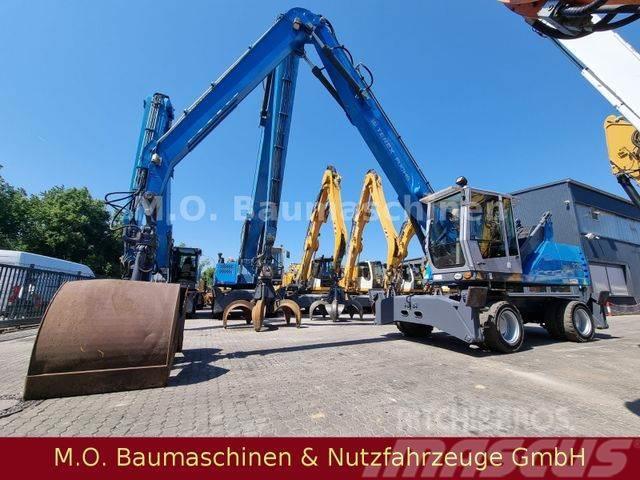 Fuchs MHL 335 / ZSA /AC/ Hochfahr.Kabine/Magnetanlage Wheeled excavators