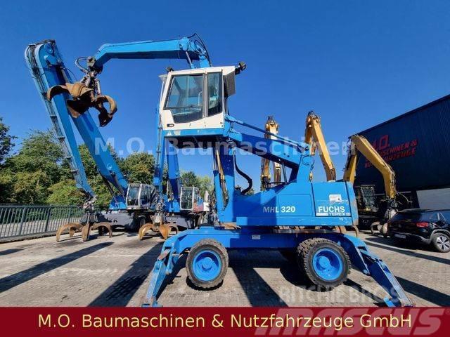 Fuchs Terex MHL 320 / Polyp/ Liftkabine Wheeled excavators